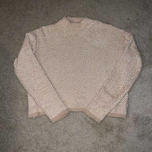 Tan/cream knit sweater with white chevron pattern